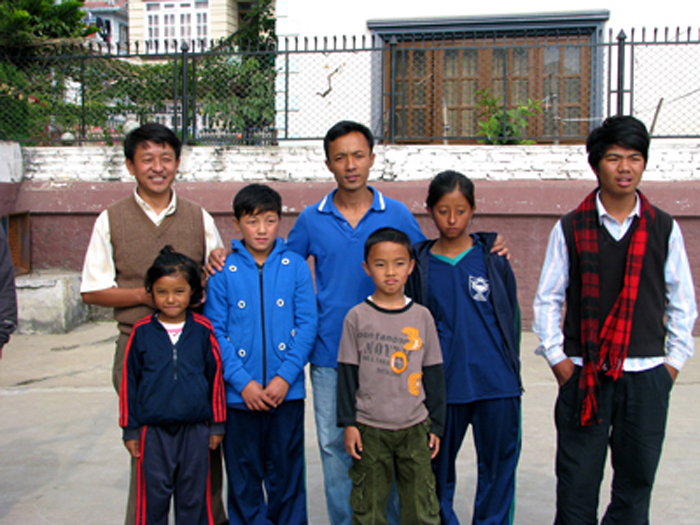 children and teachers at school in Nepal.